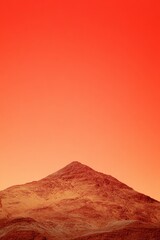 Naklejka premium Scenic Mountain Range Illuminated by Sunset Glow