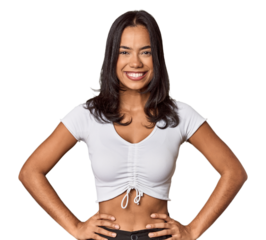 Young filipino woman confident keeping hands on hips.