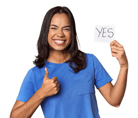 Young filipino woman showing "yes" sign