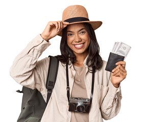 Young filipino woman with tickets and camera ready to travel