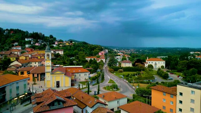 4K Aerial Drone Video of Church Belltower and Roundabout in Cavallasca, Italy on a Summer Evening