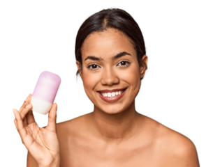 Young Filipino holding deodorant, personal hygiene