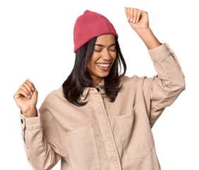 Joyful Filipino woman dancing in studio