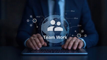 A professional working on a laptop with a digital overlay representing teamwork and collaboration in a business environment.