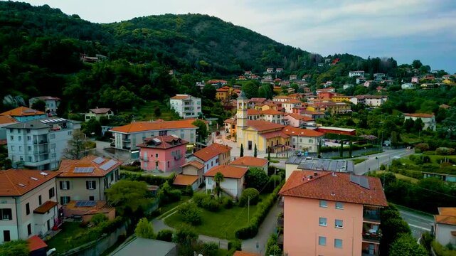 4K Aerial Drone Video of Church Belltower and Roundabout in Cavallasca, Italy on a Summer Evening