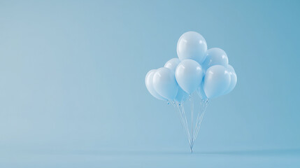 Collection of light blue balloons floating against a soft blue background