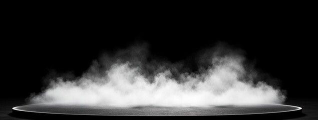 Illuminated stage with dramatic lighting and smoke, creating a captivating atmosphere for performances and presentations.