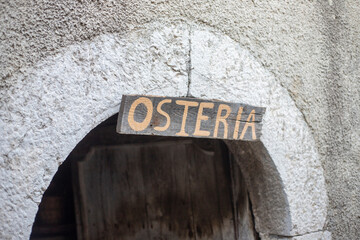 Historic Rustic Osteria Inscription on Stone Doorway