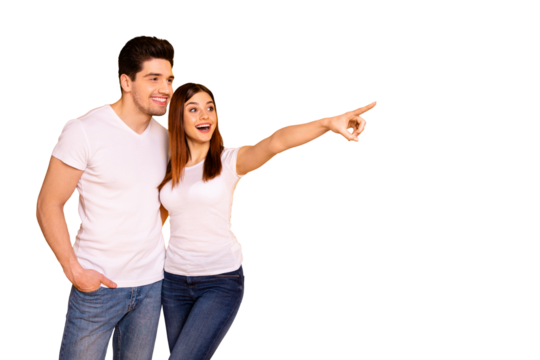 Close up photo beautiful she her he him his pair indicate fingers empty space banner placard sale discount foreign shopping abroad wear casual jeans denim white t-shirts isolated yellow background - Powered by Adobe