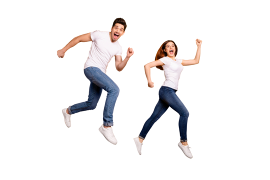 Full length side profile body size photo funky she her he him his pair jumping high hurry shopping raised fists yell scream shout loud wear casual jeans denim white t-shirts isolated yellow background