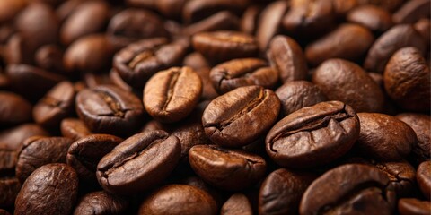 Naklejka premium A Close-Up View of Roasted Coffee Beans, Rich Brown Hues and Detailed Textures