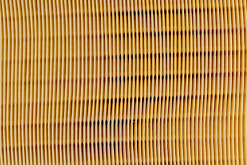 yellow paper filter for cleaning the air from dust and dirt in the car