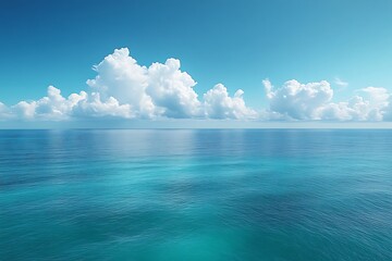 Serene ocean scene with fluffy clouds and clear blue sky.