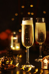 Two glasses with champagne in New Year Eve and Christmas style