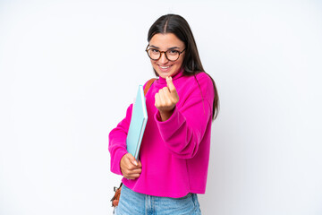 Young student woman isolated on white background making money gesture