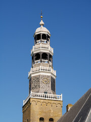 Tower of Grote Kerk church in old town of Hindeloopen, Friesland, Netherlands