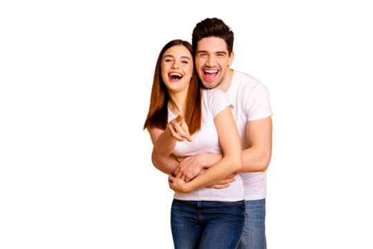 Portrait of his he her she two nice lovely attractive cheerful cheery positive people cuddling laughter pointing at you choose choice isolated over vivid shine bright yellow background