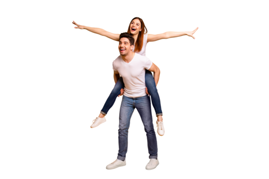 Full length body size view portrait of his he her she two nice attractive playful cheerful optimistic dreamy people wife husband having fun isolated over vivid shine bright yellow background