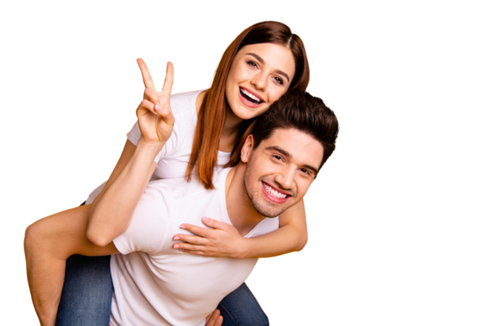 Close-up portrait of his he her she two nice attractive lovely trendy cheerful people having fun holiday care trust support dream showing v-sign isolated over vivid shine bright yellow background
