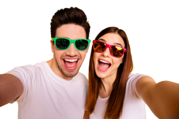 Self-portrait of his he her she two nice attractive lovely charming stylish trendy cheerful cheery glad people having fun isolated over vivid shine bright yellow background