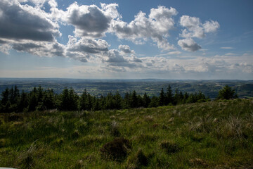 MOUNTAINOUS LANDSCAPE IN THE CLOUDS