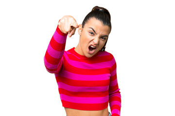 Young beauty woman over isolated chroma key background frustrated and pointing to the front