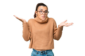 Young beauty woman over isolated chroma key background having doubts while raising hands