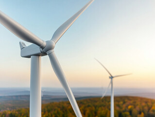 Wind turbines in scenic landscape during sunset, showcasing renewable energy