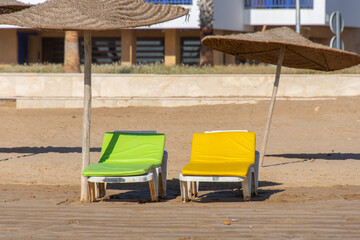 Palapas and chair installed the beach of Essaouira in the west of Morocco