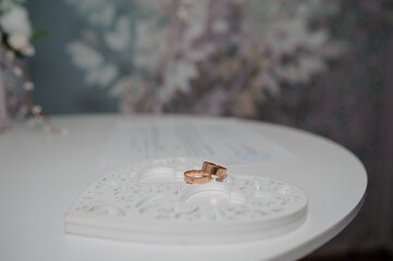 Elegant Wedding Rings on a Decorative Heart-Shaped Tray