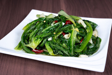 Sauteed vegetable on a white plate