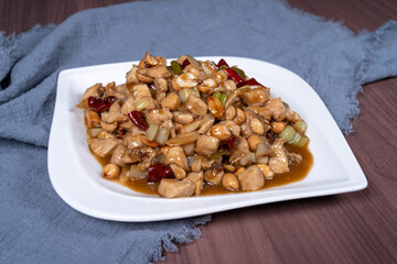 Kung Pao chicken on a white plate