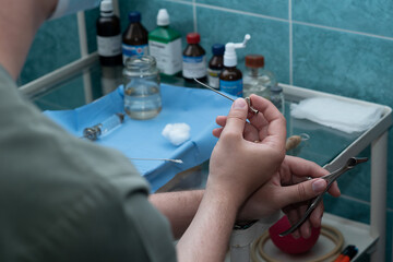 Kulikovsky needle for maxillary sinus puncture in the hands of an otolaryngologist, sinusitis, sinusitis treatment