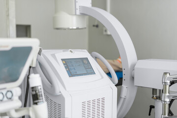 urological device for remote lithotripsy in the operating room, patient lying on the table