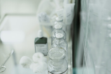 transparent glass containers in the hospital, mockup, medical drugs in a flask