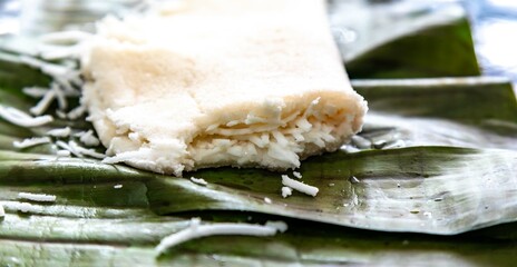 Traditional Brazilian tapioca with coconut served on a banana leaf. Amazonian tapioca