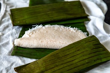 Traditional Brazilian tapioca with coconut served on a banana leaf. Amazonian tapioca