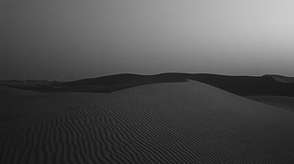 Monochromatic Desert Dunes at Dusk: A Serene Landscape