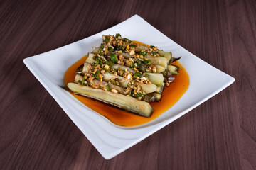 Eggplant salad on a white plate