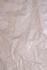 Obraz premium background and texture. crumpled background of light brown-pink shade