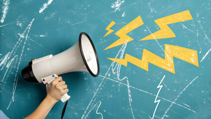 A vibrant and creative composition featuring a hand holding a white megaphone with a black rim. The megaphone emits three yellow lightning bolt icons, symbolizing sound or announcement, on the left si