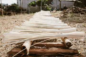 Bamboo strips are cut into small pieces and used for weaving or tying things.
