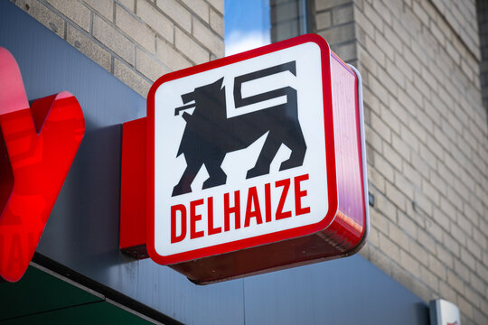 Delhaize shop logo sign above the entrance of the store. Ahold Delhaize is one of the world's largest food retail groups. Antwerp, Belgium. 15 April 2023. 