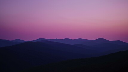 Fototapeta premium Ultra-realistic image of gradient mountain silhouettes at dawn, shifting from dark purple to light pink in the sky 