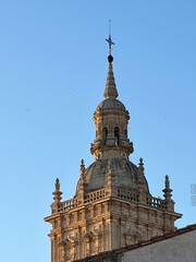 Fototapeta premium Top of Burgo de Osma Cathedral bell tower at sunset