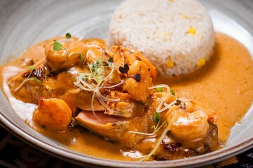 Gourmet dish with shrimp and rice.