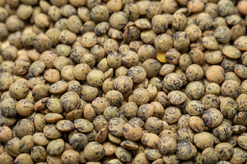 Dry french lentils close up macro view.