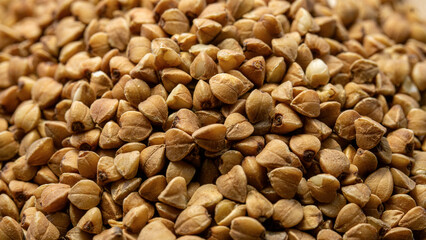 Buckwheat grains close up macro view.