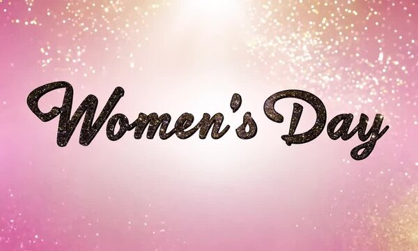 A pink background with glittery letters that say Women's Day. The letters are bold and stand out against the pink background