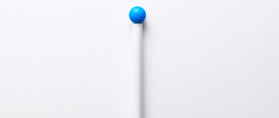 Single blue sphere on white stick.
